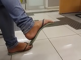 Amateur flip-flop dangling on bank