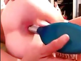 Fucking  her ass with hairbrush