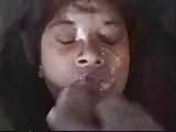 Ebony gets her face covered with cum