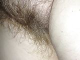 rubbing her hairy pussy at night,