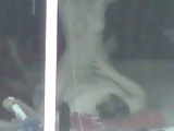 Voyeur window sex of couple