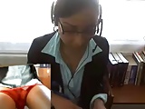 Black girl in office setting rubs pussy, flash ass