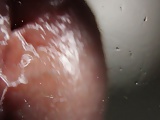 macro close up cumming on glass