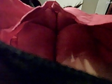 Upskirt 3 - Black thong under red skirt