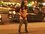 horny girl stripping in public in front of crowd