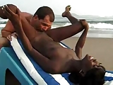 Interracial couple sex on the beach