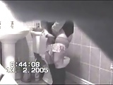 Woman masturbating in the toilet