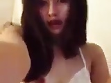 Cute asian girl playing herself on cam