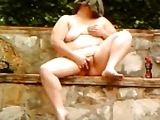 risky public orgasm in hotel courtyard,