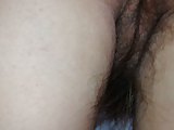 stroking her pubic hair on her ass and pussy.