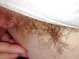 long pubes escaping from her white pantys,