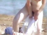 Cutie changing on the beach