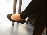 Student Ballerina shoes barefeet dangling