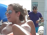 Topless beach girl with massive tits