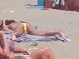 YELLOW BIKINI GIRL MASTURBATING ON THE BEACH