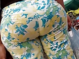 Latina milf in colorful flower pants