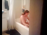 young redhead wife in the bath