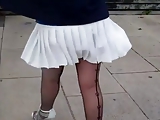 White pleated skirt and stockings