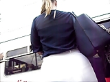 Gorgeous blonde with big round ass in tight white skirt