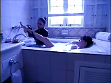 lesbian slave lick mistress feet in bath