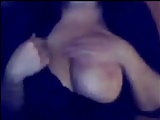 Showing her big tits on cam