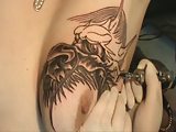 Tattooing Dragon Head on Tit !!!