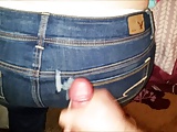 Cumshot on tight jeans ass