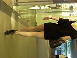Upskirt - Girl in tight miniskirt and leopard pump
