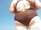 Granny with a big ass on the beach! Amateur voyeur!