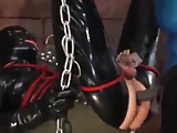 Latex Mistress fucks her chastity slave in sex swing