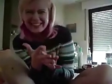 Pink haired girl jerks off a big cock