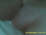 My wife in bed showing her big breasts and pussy hair