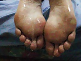 Cumshot on her dirty, tired, sexy soles after work.