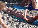 CHECK OUT THIS BLONDE WITH TIGHT BODY ENJOYS THE BEACH.