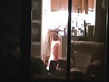 Neighbour in her kitchen