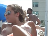 Beauty with gorgeous tits at swim pool 