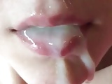 close-up full load in mouth from young girl