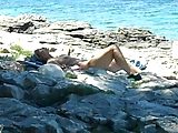 older lady naked on nudist beach