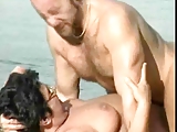 Mature fucking on a beach