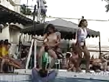 Thai girls dancing by the pool