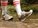 Caroline New Balance sneaker hike with mud and water preview