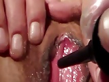 Vibrator in her wet cunt